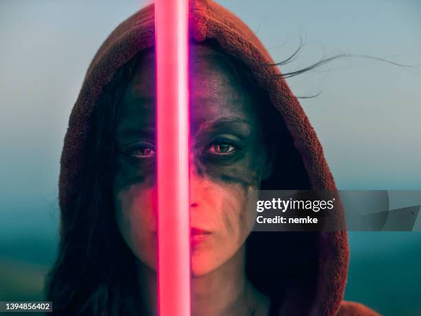 anime stylized female warrior - laser sword stock pictures, royalty-free photos & images