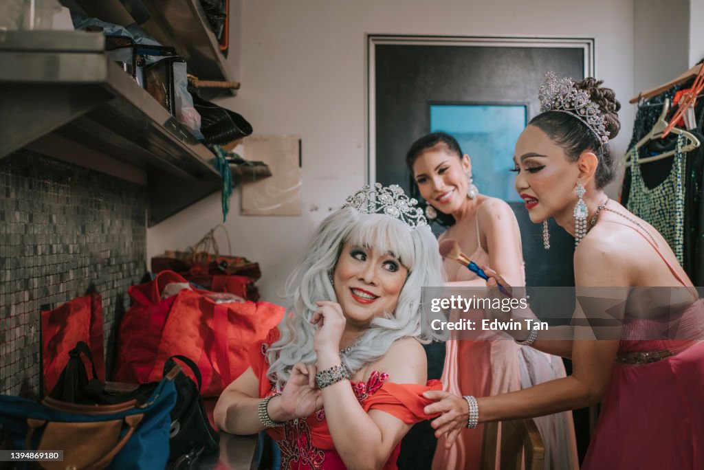 Asian LGBT drag queen stage performance getting ready at backstage make up before performance at pub