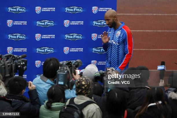 French football player Nicolas Anelka of Shanghai Shenhua attends a press conference after a warm-up match between Shanghai Shenhua and Hunan...