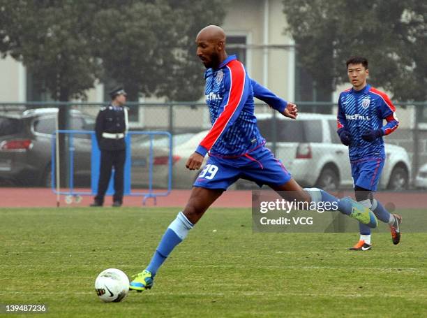 French football player Nicolas Anelka of Shanghai Shenhua in action during a warm-up match between Shanghai Shenhua and Hunan Xiangtao at Shenhua...