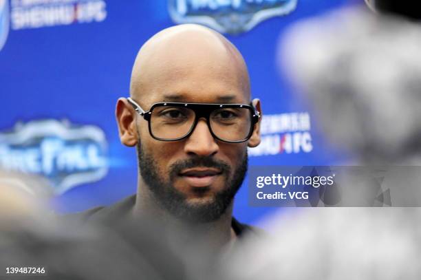 French football player Nicolas Anelka of Shanghai Shenhua attends a press conference after a warm-up match between Shanghai Shenhua and Hunan...