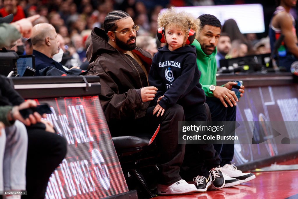 Drake Rapper At Raptor Game Rapper Drake and his son Adonis take in the Game Six of the Eastern ...