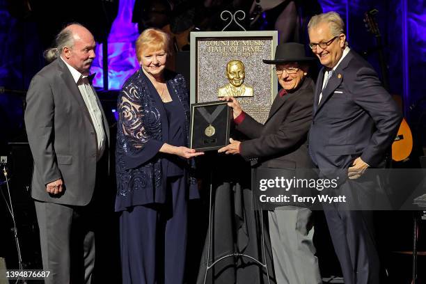 Johnny Drake and Rose Drake accept Country Music Hall of Fame and Museum induction on behalf of Pete Drake presented by Charlie McCoy and CEO of the...