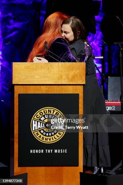 Inductee Wynonna Judd and Ashley Judd speak onstage for the class of 2021 medallion ceremony at Country Music Hall of Fame and Museum on May 01, 2022...