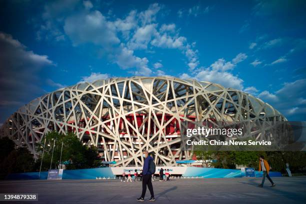 Tourists visit the central area of Beijing Olympic Park during the May Day holiday on May 1, 2022 in Beijing, China.