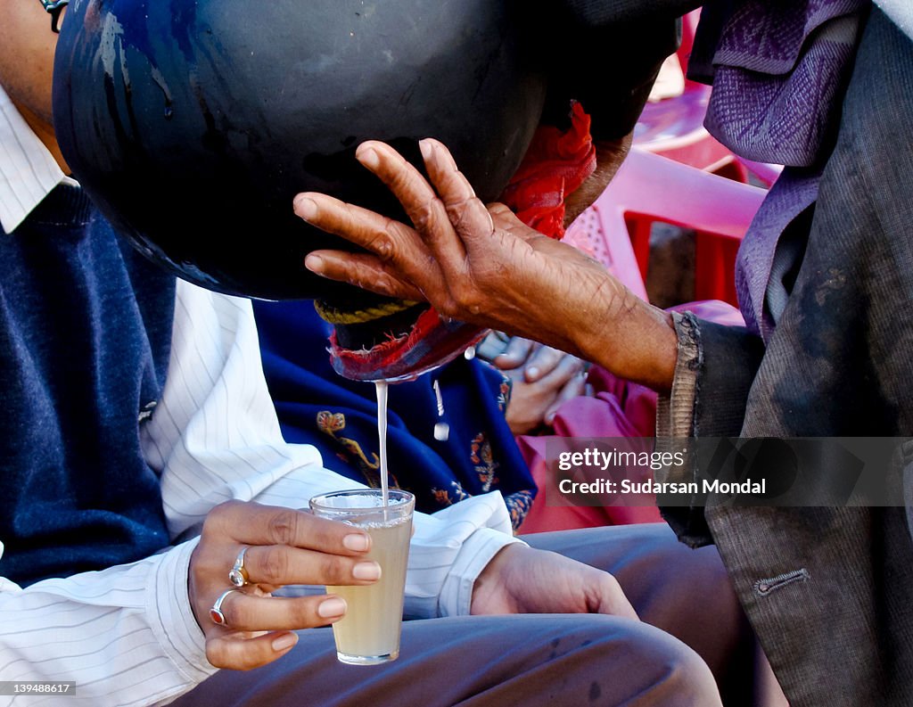 Thirsty pilgrim at Gangasagar