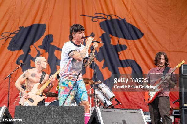Flea, Anthony Kiedis, and John Frusciante of the Red Hot Chili Peppers perform during 2022 New Orleans Jazz & Heritage Festival at Fair Grounds Race...