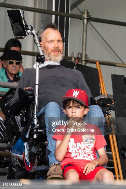 Former NFL player Steve Gleason and his son, Rivers Gleason, watch Red Hot Chili Peppers perform during 2022 New Orleans Jazz & Heritage Festival at...