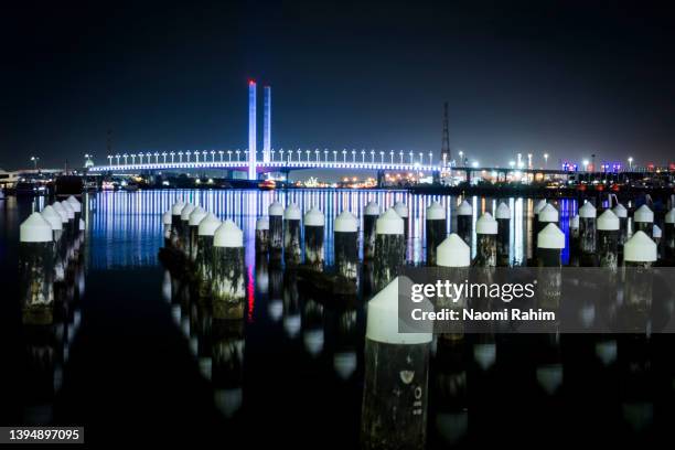 bolte bridge and melbourne docklands pier ruins at night - white night melbourne stock pictures, royalty-free photos & images