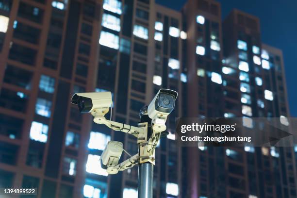 security camera in residential area. - malware bildbanksfoton och bilder