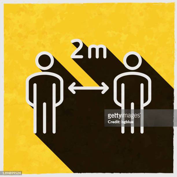 social distancing - 2 meter. symbol mit langem schatten auf strukturiertem gelbem hintergrund - light meter stock-grafiken, -clipart, -cartoons und -symbole