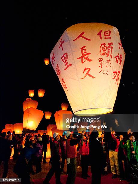 teresa teng lantern - releasing lanterns stock pictures, royalty-free photos & images