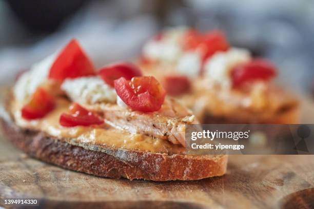 breakfast toast, topped with peanut butter, cheese and salmon - peanut butter toast stock pictures, royalty-free photos & images