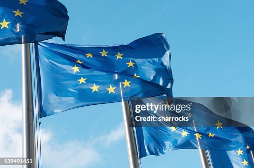 Four European Union flags waving in the wind Four European Union flags waving in the wind