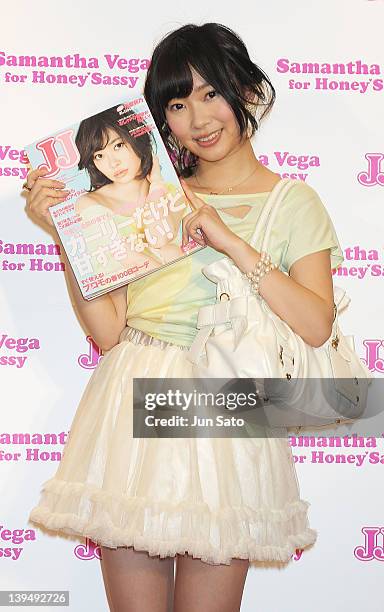 Rino Sashihara of AKB48 poses for a photograph at Samantha Thavasa Deluxe Omotesando Gates store on February 22, 2012 in Tokyo, Japan.