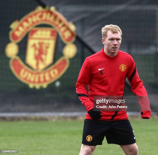 Paul Scholes of Manchester United in action during a first team training session, ahead of their UEFA Europa League round of 32 second leg match...