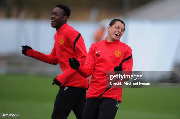 Javier Hernandez and Danny Welbeck share a joke during the Manchester United training ahead of their UEFA Europa League round of 32 second leg match...