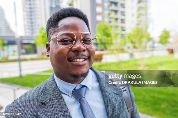 young african business man - close up . - black suit close up stock pictures, royalty-free photos & images