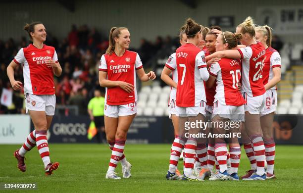 Nikita Parris of Arsenal celebrates with teammates after scoring their team's seventh goal during the Barclays FA Women's Super League match between...