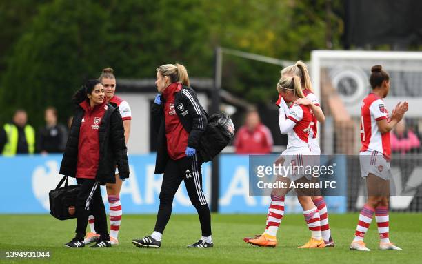 Leah Williamson of Arsenal embraces teammate Jordan Nobbs who walks off the pitch during the Barclays FA Women's Super League match between Arsenal...