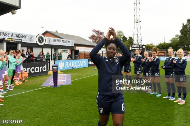 Anita Asante of Aston Villa walks through a guard of honour from players of Arsenal and Aston Villa in recognition of her upcoming retirement at the...