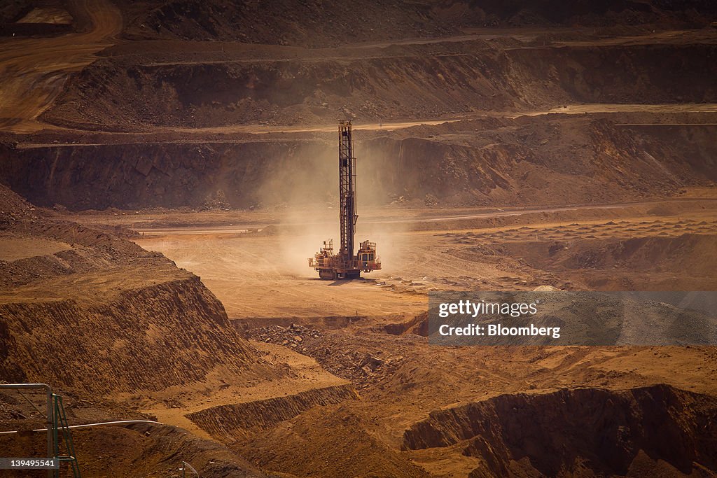 Pit Tech Rio Tinto A blast hole drill operates in the pit at Rio Tinto Group's West ...