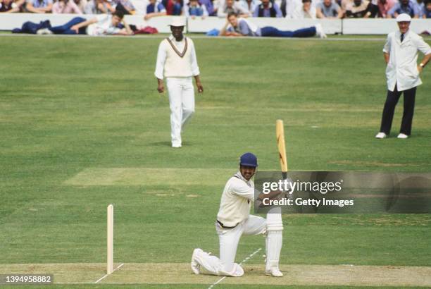 India batsman Kris Srikkanth during his match top score of 38 cuts a ball towards the boundary watched by the square leg umpire Barrie Meyer and...