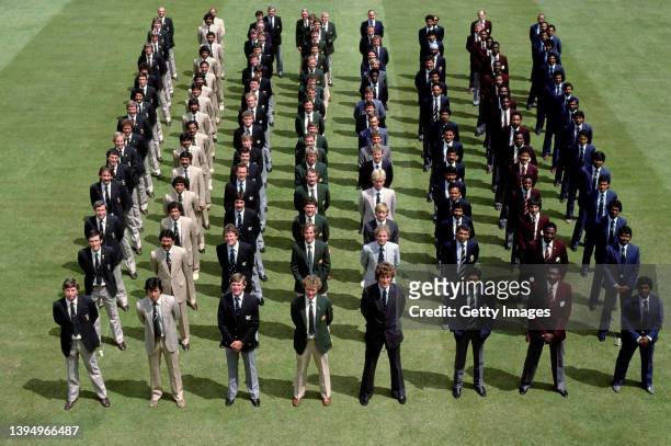 The eight competing teams line up on the outfield at Lords for a picture ahead of the 1983 Prudential Cricket World Cup, The team captains from left...
