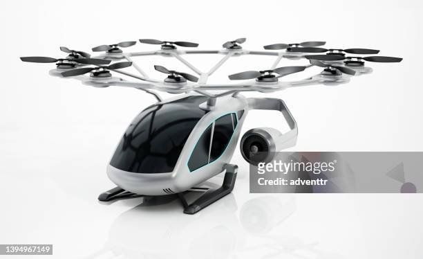 conceptual evtol (electric vertical take-off and landing) design isolated on white - flying cars stockfoto's en -beelden
