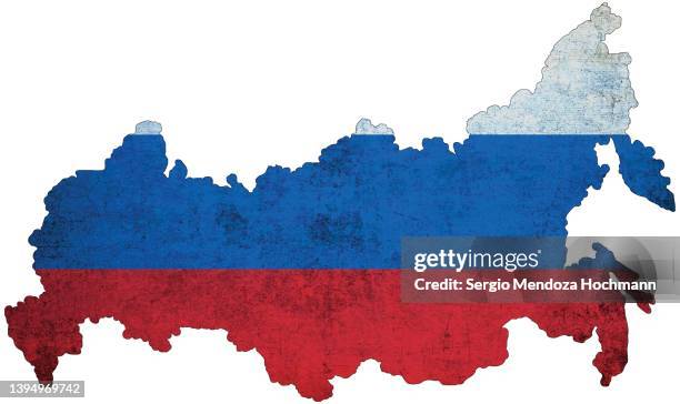 map of russia with the russian flag with a grunge texture - russian stockfoto's en -beelden