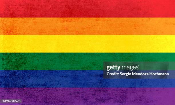 pride flag, rainbow flag with a grunge texture - pride flag stock pictures, royalty-free photos & images