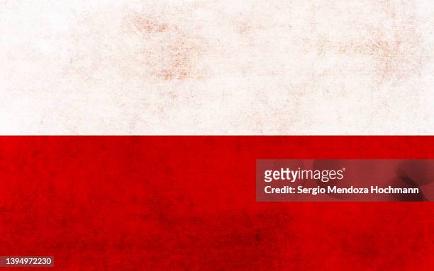 flag of poland with a grunge texture - polonia bandiera foto e immagini stock