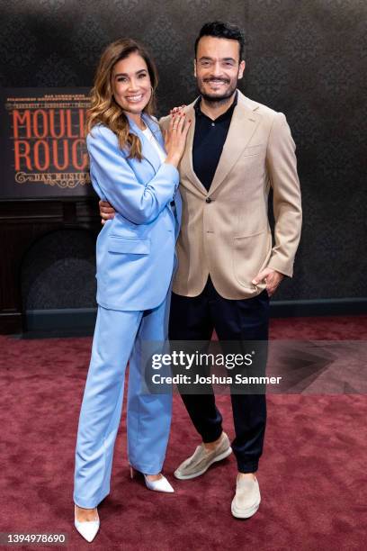 Jana Ina Zarrella and Giovanni Zarrella pose during a photo call for the musical "Moulin Rouge" at Musical Dome Cologne on May 02, 2022 in Cologne,...