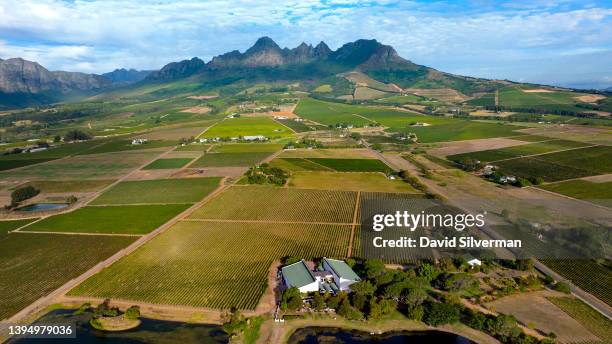 An evening aerial view of the Eikendal winery estate on the slopes of the Helderberg Mountain during harvest season on March 15, 2022 in the Western...