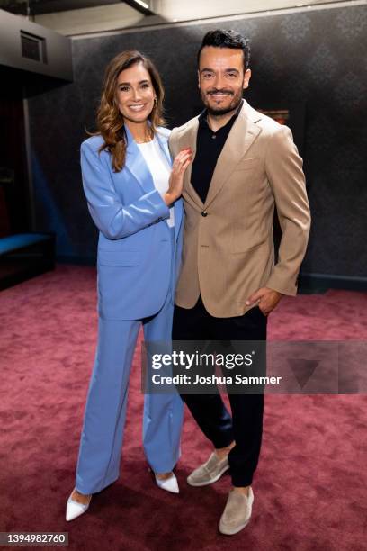 Jana Ina Zarrella and Giovanni Zarrella pose during a photo call for the musical "Moulin Rouge" at Musical Dome Cologne on May 02, 2022 in Cologne,...