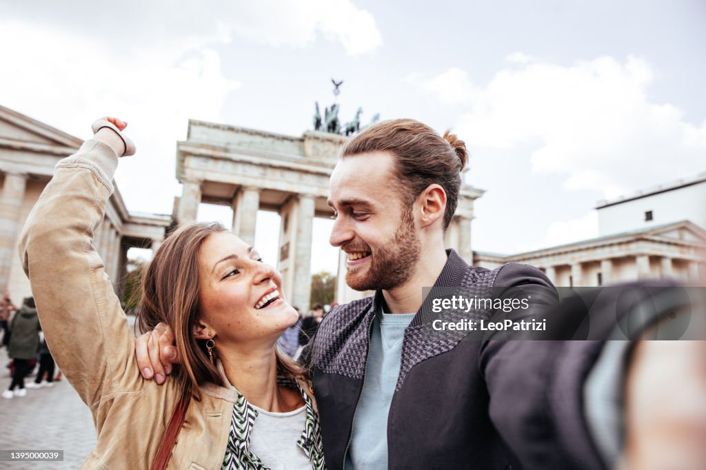 Couple take a snaps from their latest trip