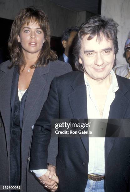 Actor Dudley Moore and date Brogan Lane attend the "Saturday Night Live" Cast and Crew Post Party on January 25, 1986 at the Nirvana Club in New York...
