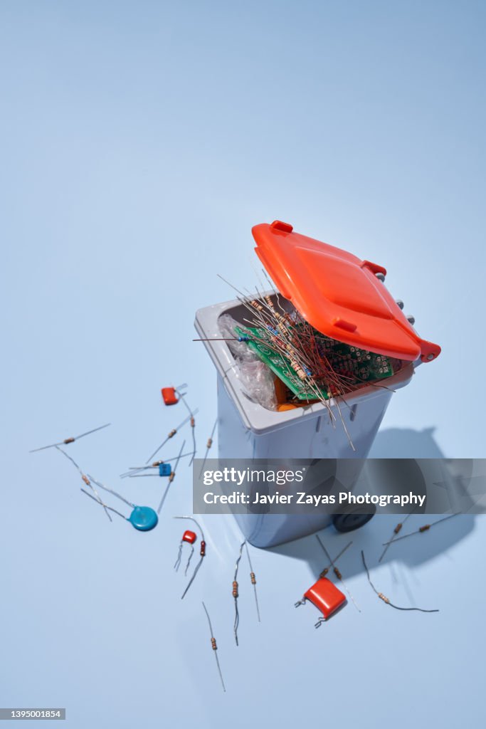 Electronic Waste Container Example Electronic Waste Inside A Waste Container On Blue Background High-Res ...