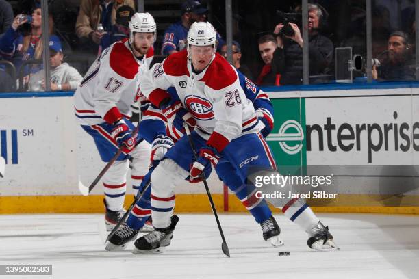 Christian Dvorak of the Montreal Canadiens skates with the puck against the New York Rangers at Madison Square Garden on April 27, 2022 in New York...