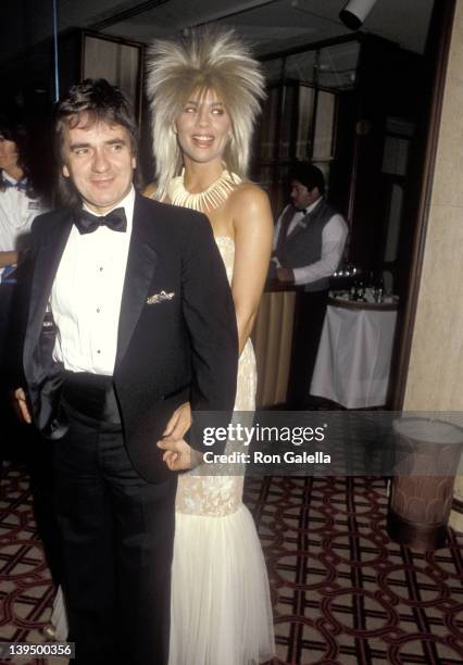 Actor Dudley Moore and date Brogan Lane attend the First Annual American Cinematheque Award Salute to Eddie Murphy on February 28, 1986 at Century...