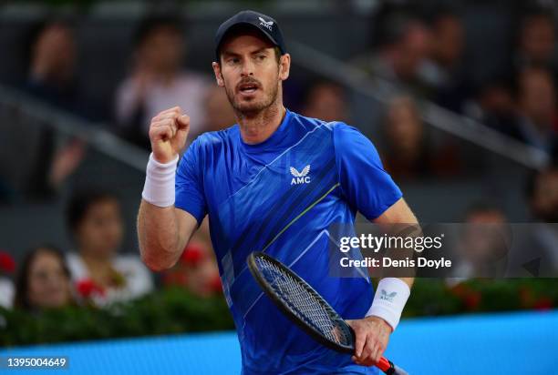 Andy Murray of Great Britain reacts during their First Round match against Dominic Thiem of Austria on day five of the Mutua Madrid Open at La Caja...