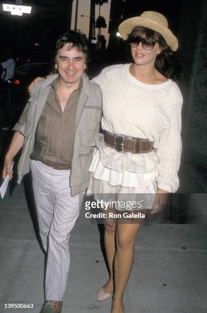 Actor Dudley Moore and wife Brogan Lane attend "A Fish Called Wanda" Beverly Hills Premiere on July 13, 1988 at Academy Theatre in Beverly Hills,...