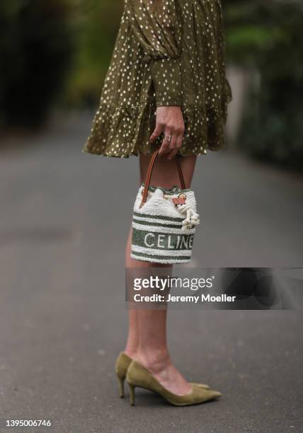 Yasmin von Schlieffen-Nannen seen wearing a khaki green short dress from Zimmermann, a bucket bag from Celine and light green Jimmy Choo heels on...