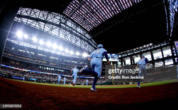 The Texas Rangers take the field before playing against the Atlanta Braves at Globe Life Field on May 1, 2022 in Arlington, Texas.