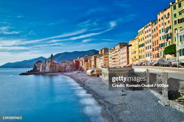 panoramic view of sea and buildings against sky,camogli,italy - camogli bildbanksfoton och bilder