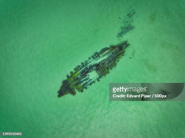 aerial view of boat in sea,sweden - sunken stockfoto's en -beelden