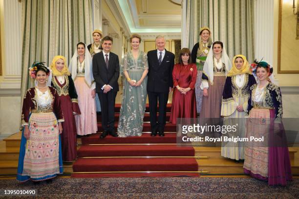 Mr Pavlos Kotsonis, King Philippe of Belgium, Queen Mathilde and President of Greece Katerina Sakellaropoulou pose with women wearing different...