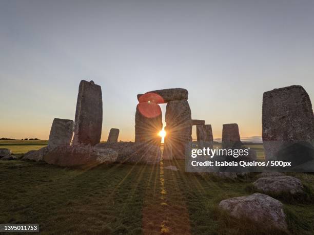 view of old ruins against sky during sunset - solstice stock pictures, royalty-free photos & images