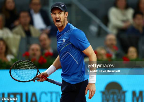 Andy Murray of Great Britain reacts during their First Round match against Dominic Thiem of Austria on day five of the Mutua Madrid Open at La Caja...