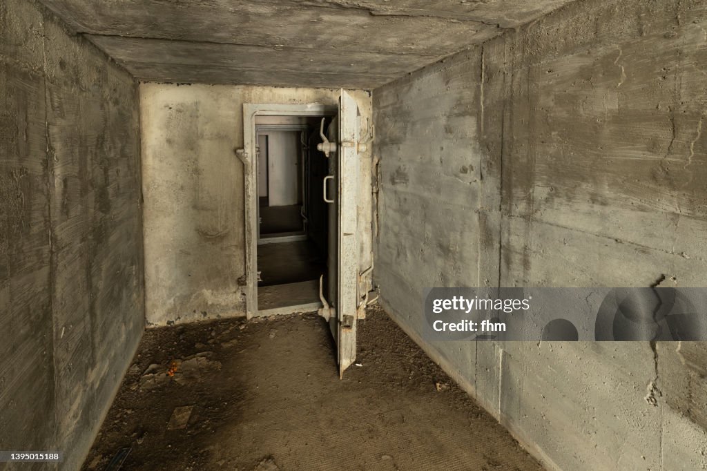Tunnel to the bunker with open gate